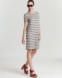 Exude California-cool style in a MARC BY MARC JACOBS stripe dress. Braided trim at the neckline and slit pocket with patch seam detail lend unique detail to this easygoing, go-to silhouette.