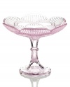 Past meets present. Feminine scalloped edges and fluted accents in beautifully hued glass make this Modern Vintage compote a standout at the table and on display. From the Godinger serveware collection.