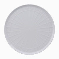 Modern in design with a raised circular pattern, made from French Limoges Porcelain. Dishwasher and microwave safe.