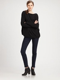 Luxurious take on a wardrobe essential, this soft cashmere boatneck has dropped shoulders, ribbed sleeves and a length that hits below the hips. BoatneckDropped shouldersLong sleevesLonger length hits below the hipsCashmereDry cleanImportedModel shown is 5'9½ (176cm) wearing US size Small.