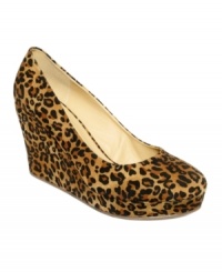 How fun. The Elizabeth wedge platform pumps by Barefoot Tess brings the exotic essence of the animal kingdom into your closet.