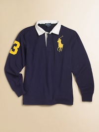 A classic rugby is updated with heritage details for an always-preppy look.Pointed polo collarLong sleevesButton-frontEven vented hemCottonMachine washImported Please note: Number of buttons may vary depending on size ordered. 