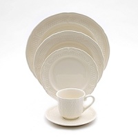 In 1821, Gien was founded for the purpose of bringing fine English earthenware manufacturing techniques to France. Pont Au Choux White is an ivory dinnerware collection with intricate inlaid design work.