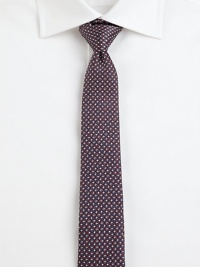 A sleek design, set in perfectly patterned Italian silk.About 2½ wideSilkDry cleanMade in Italy