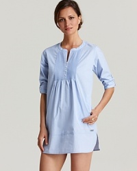 A long sleeve sleepshirt with rollable sleeves and pleated front.