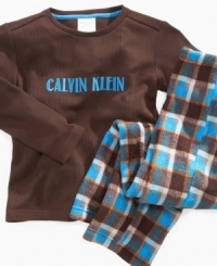 Warm up his winter. When it's time to bed down this thermal tee and plaid fleece pants set from Calvin Klein is an ultra-comfortable style.