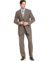 Constructed with neat, modern lines and accented with vintage sharkskin, this smart and sophisticated Michael Kors suit makes a great choice for the office or any formal occasion.