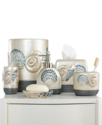 Life's a beach! Charm your bathroom in a look of seaside-inspired beauty with this Hampton Shells tumbler, featuring eclectic seashells in tan and blue tones for a calming appeal.