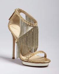 Fringe element: These B Brian Atwood platform evening sandals are wow all the way, with metallic, snake-embossed straps embellished with rows of glimmering fringe that shakes it with every move.