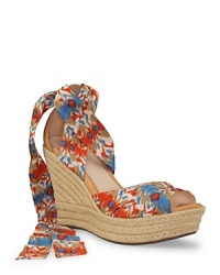 A summer shoe from UGG® Australia--the Lucianna sandals feature a silk ankle wrap that feels smooth against the skin.