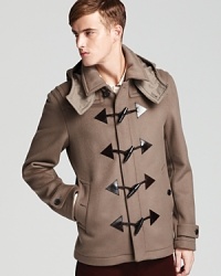 Burberry London reinvents the classic duffel coat with a modern, cropped silhouette.