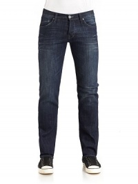 THE LOOKMedium dark wash blue denimNarrow waistband with belt loops and logo button closureFront zipperFive-pocket styleFaded detailsStraight leg silhouetteBack waist logo patchBack pocket decorative stitching THE FITRise, about 9Inseam, about 32THE MATERIAL99% cotton/1% spandexCARE & ORIGINMachine washImported