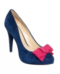 A cute bow on the toe of Paris Hilton's Amelie platform pumps adds feminine charm to this smooth suede style.