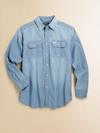 Rugged chambray cotton transforms a traditional button-down silhouette into a handsome workshirt, complete with dual chest pockets for an authentic, rustic feel.Pointed collarLong sleeves with barrel cuffsButton frontButton-flap patch pocketsShirttail hemCottonMachine washImported Please note: Number of buttons may vary depending on size ordered. 