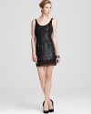 Add serious sparkle to your after-dark portfolio with this sequin-encrusted Basix dress.