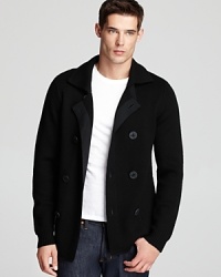 Rendered in soft wool, this pea coat-inspired sweater exemplifies the skillful innovation of Vince.