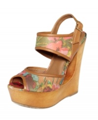 Floral and fierce. Botanical prints on Steve Madden's Draagon wedge sandals will freshen up your favorite summer outfits in an instant.