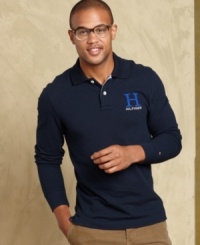 Classic and versatile, this slim-fit Tommy Hilfiger shirt is the perfect anytime go-to.