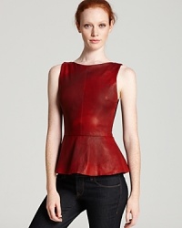 Sinfully supple leather comprises an Alice + Olivia top, complete with an on-trend peplum hem and provocative mesh back. Altogether, a luxe look that's a daring delight.