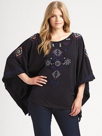 It's the poncho re-imagined with vivid embroidery, a relaxed fit and unquestionable charm.Round neckPull-on styleAbout 28 from shoulder to hemCottonMachine washImported