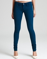 Color your denim collection with these SOLD design lab skinny jeans, tailored to sleek, laid-back perfection.