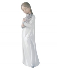 A comforting display of reciprocated love, this timeless figurine is handcrafted of smooth porcelain and offers the perfect gift for someone special.