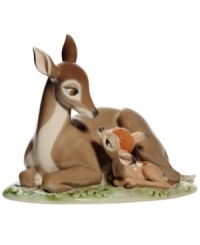 Disney fans will fawn over this beautiful figurine of Bambi gazing up at his doe-eyed mother. Handcrafted in Nao by Lladro porcelain.