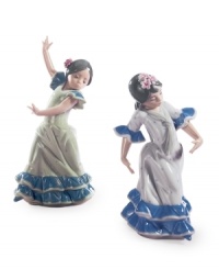 Get into the groove. A beautiful Latin dancer, Lolita, dons a traditional dress and flowers in her hair to get the fiesta going. Handcrafted by Lladro.