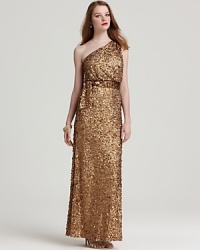 Encrusted in sparkling sequins, this Aidan Mattox one-shoulder gown is destined to steal the spotlight.