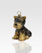 Fluffy puppy in mouth-blown glass is handpainted by Polish artisans with intricate detail. Handpainted glass Each ornament takes 7-10 days to complete Arrives in gift box ideal for giving or storing 1½W X 2½H X 2D Handmade in Poland 