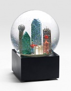 EXCLUSIVELY OURS. The Dallas musical water globe features city scenes and landmarks including: Reunion Tower, Magnolia Building First Interstate Tower, Big Tex and more Plays Deep In The Heart Of Texas Glass dome and resin figures 6 high Imported