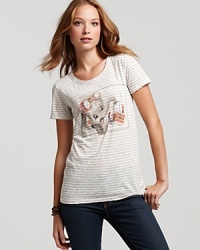 Dumbo arrives on this striped Patterson J. Kincaid tee, adorable for the weekends with your favorite denim. Layer it under a cardi for a cozy fall and flaunt dynamic Disney style.