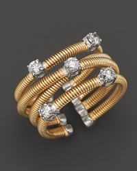 Scattered diamonds set in 14K yellow gold.