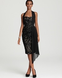 Utterly glamorous, this chic ML Monique Lhuillier dress exudes luxury in intricate, sequined lace.