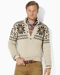 A bright design of intarsia snowflakes and festive patterns enlivens a handsome button-front pullover in a luxe blend of linen and cotton.