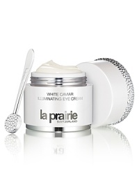 La Prairies White Caviar Illuminating Systeme brightens your skin with an innovative approach to controlling the appearance of discoloration, while offering the legendary benefits of caviar.Unprecedented brightening, supporting and luxury are yours in an illuminating collection so unique you will think of it as a ritual of enlightenment. Imperial caviar, so scarce and desirable it was once reserved for royalty, is at the heart of the White Caviar Illuminating Systeme.Achieve unparalleled brightening for the most expressive part of your faceyour eyes! This sheer, hydrating cream targets the appearance of darkness in the eye area that can be caused from hyper-pigmentation or circulation issues. It brightens, supports and smooths as it targets eye-area aging concerns; the appearance of dark circles, puffiness and wrinkles.The Benefits: Helps to detoxify and boost micro-circulation to help brighten under eye darkness Helps to diminish under eye puffiness and gives a relaxing effect that smooths expression lines and wrinkles Skin is nourished, moisturized and protected against future damage with potent anti-oxidantsThe Application:Apply to under eye area, continuing over the top of the lid and along the brow bone- upwards to the eyebrows. Avoid getting into eyes.Usage:Use AM and PM.