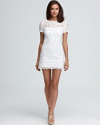 Brimming with ladylike charm, this Lilly Pulitzer dress showcases delicate lace cast in a floral motif. Team with espadrilles and step out into the sunshine.