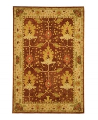 Savor the natural landscape. This sublime rug from the Anatolia collection features deep color, rich texture and a nature-inspired tableau. A latticework pattern overlaying the earth-toned palette and graceful botanic shapes recalls the serene experience of gazing through a window. Hand-tufted of fine wool and dyed using an ancient pot dying technique.