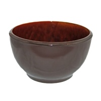 A deep matte finish is warmly contrasted by a rich, reactive glaze on these sturdy ceramic dishes from Euro Ceramica.