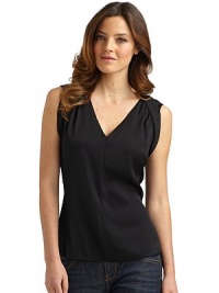 THE LOOKHalter-look angled bands ease into back foldover collarDeep V-necklineShort cap sleeves with soft shoulder pleatsLoose fittingTHE FITAbout 23 from shoulder to hemTHE MATERIAL95% silk/5% elastaneCARE & ORIGINDry cleanImportedModel shown is 5'10 (177cm) wearing US size Small. 