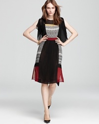 Classic primary colors feel fashion forward on BCBGMAXAZRIA's color blocked, split-sleeved midi dress.