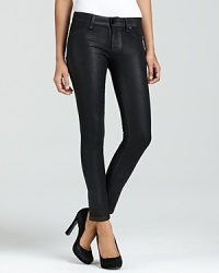 A slick coated wash adds tough-girl allure to these DL1961 legging jeans.