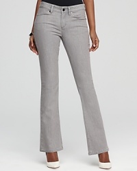 A classic style spiked with contemporary attitude, the essential AK Anne Klein bootcut jeans get a shot of city-chic edge with a faded grey wash.