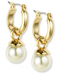 A fashionable classic. These Anne Klein earrings feature a small hoop design with an imitation pearl drop. Crafted in gold tone mixed metal. Silver tone click backing. Approximated drop: 1/2 inch.