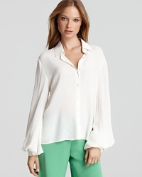 Rework the white shirt with this Alexis blouse. Dramatic blouson sleeves and exaggerated cuffs turn basic to breathtaking in one subtly dramatic statement.