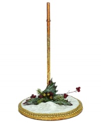 Put your Mark Roberts figurine on a pedestal of shimming snow and gold. A bit of Christmas foliage adds to the festive display.