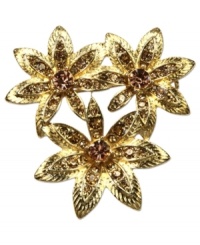 An alluring bouquet from Jones New York. This golden pin in a three-flower design beams with topaz hues. Finished with glass accents. Crafted in gold tone mixed metal. Approximate length: 2 inches. Includes gift box.