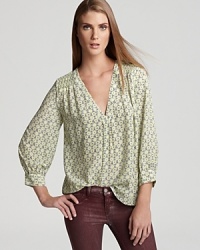 This feminine, floral printed Joie top lends effortless elegance to any ensemble.