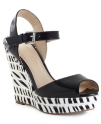 Out of the ordinary. Enzo Angiolini's Indulgent wedge sandals feature the animal print on the platform and wedge instead of the upper, with surprisingly cute results. (Clearance)