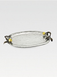 From the Lemonwood Collection. A shapely oval tray of silvered glass is superbly accented with sculptural twig handles of oxidized cast metal, each accented with a glowing, golden lemon.Goldplated metal alloyOxidized bronzeSilver glassHand-finished20L X 12.75WHand washImported